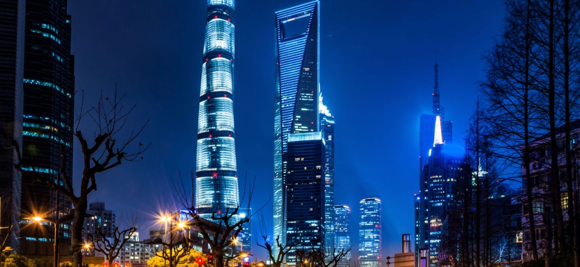 cars motion blur on city road at night in shanghai financial and