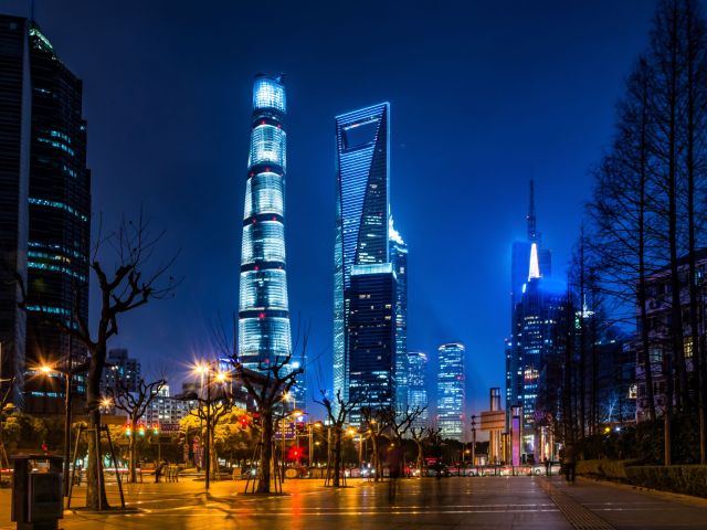 cars motion blur on city road at night in shanghai financial and